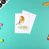 Robin On The Grass Greetings Card