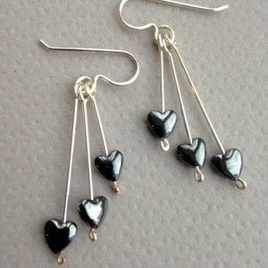 Heart drop earrings.